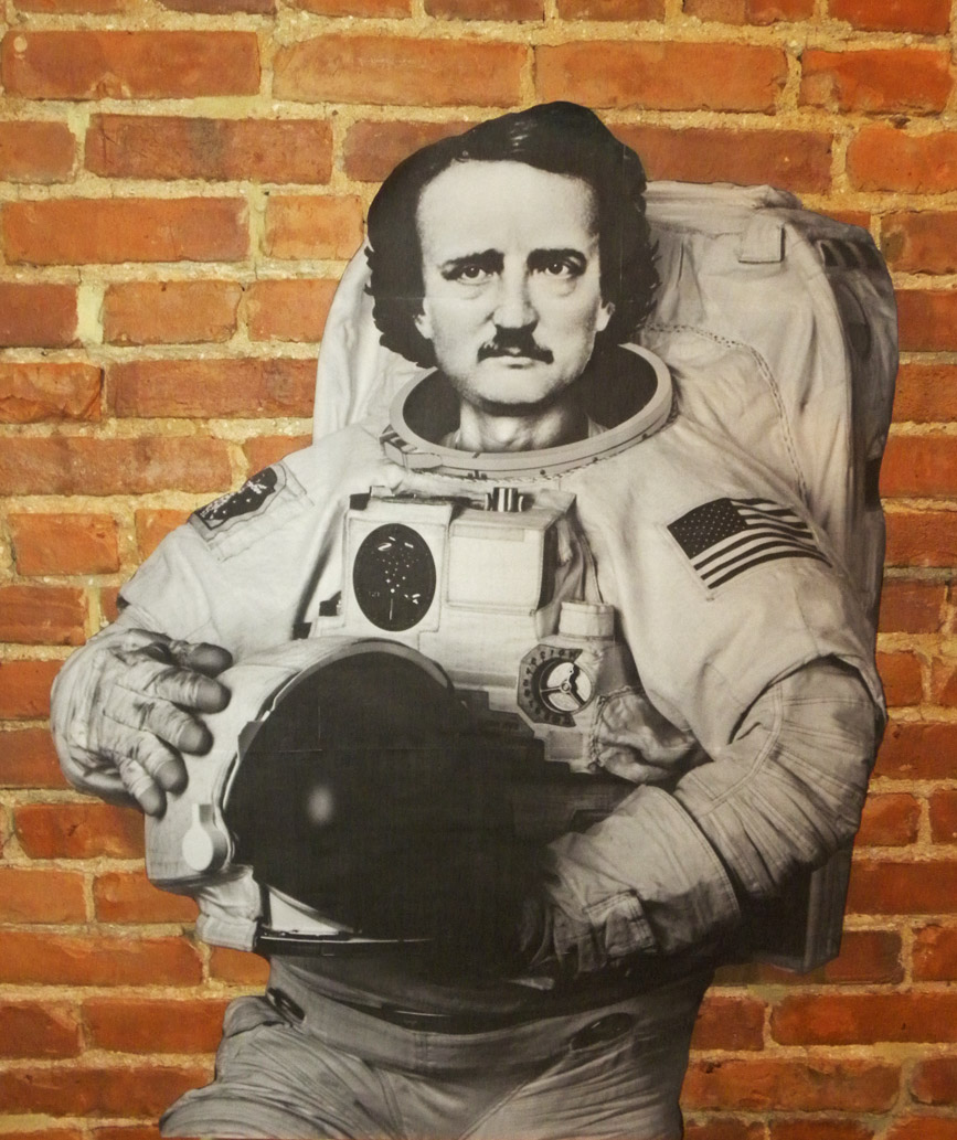 This is a Edgar Allan Poestronaut wheatpaste by the artist TOVEN in Baltimore near Poe's gravesite.